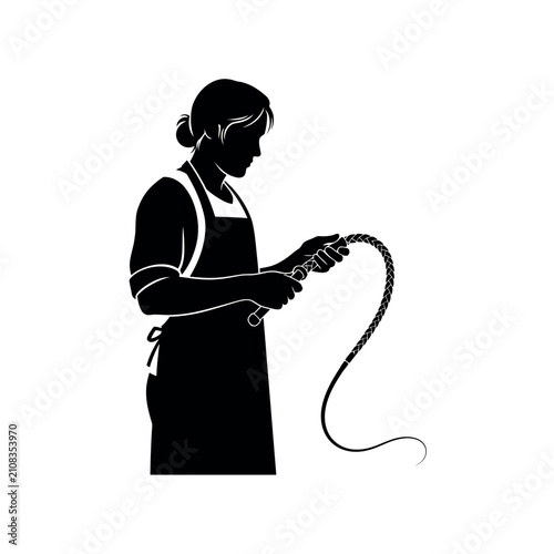 Obraz na plátně Silhouette of a woman holding a whip.