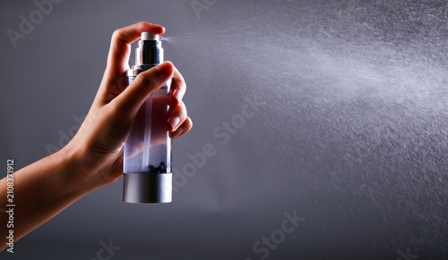 Bild auf Leinwand Spray water with a spray bottle