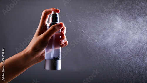 Spray water with a spray bottle