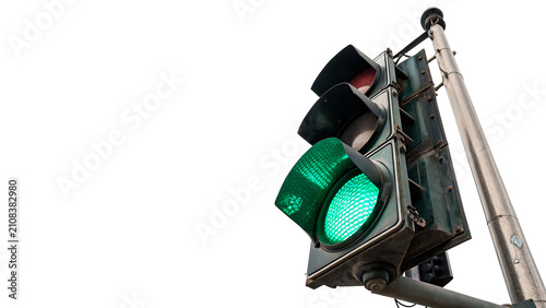 Green traffic light signal with metallic pole isolated on transparent background cut out