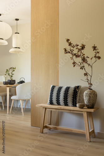 Minimalist Home Interior with Wooden Bench and Decorative Elements, Scandinavian Design with Warm Natural Light