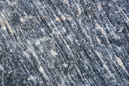 Raw natural Grantite rock closeup, textural background