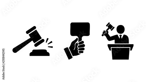 Black auction gavel and bidder paddle icons set
