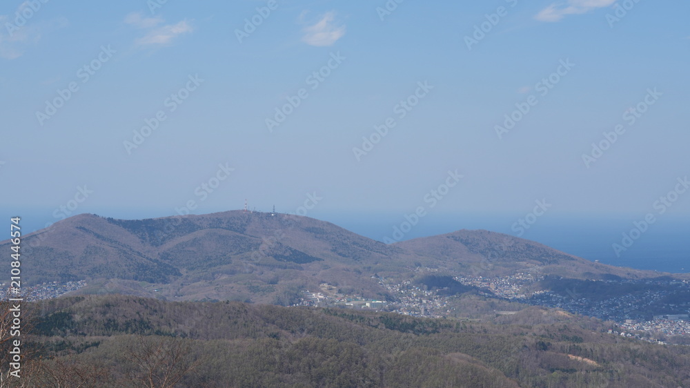 Fototapeta premium The beautiful overlooking city view which is near the sea from the top of the mountains