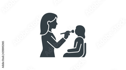 Tableau sur toile Female doctor examining a child.