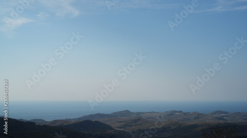 Konstfotografi The beautiful overlooking city view which is near the sea from the top of the mo