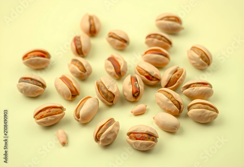 Scattered pistachio nuts on...