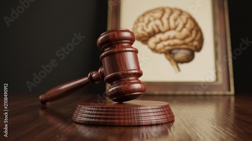 Wooden judge gavel placed on polished desk with anatomical brain in background, representing legal neuroscience, and forensic psychology, concepts in courtroom
