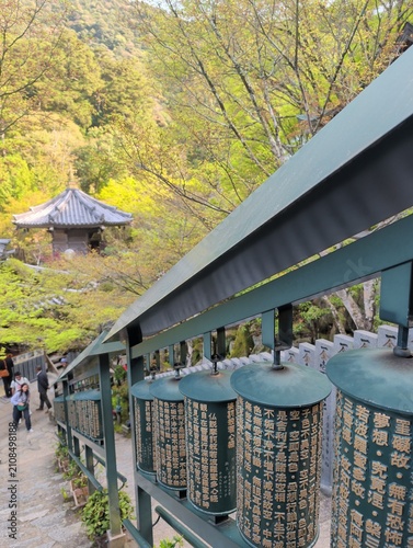 Fotografie Miyajima Island Prayer Wheels and Temple Spring Foliage