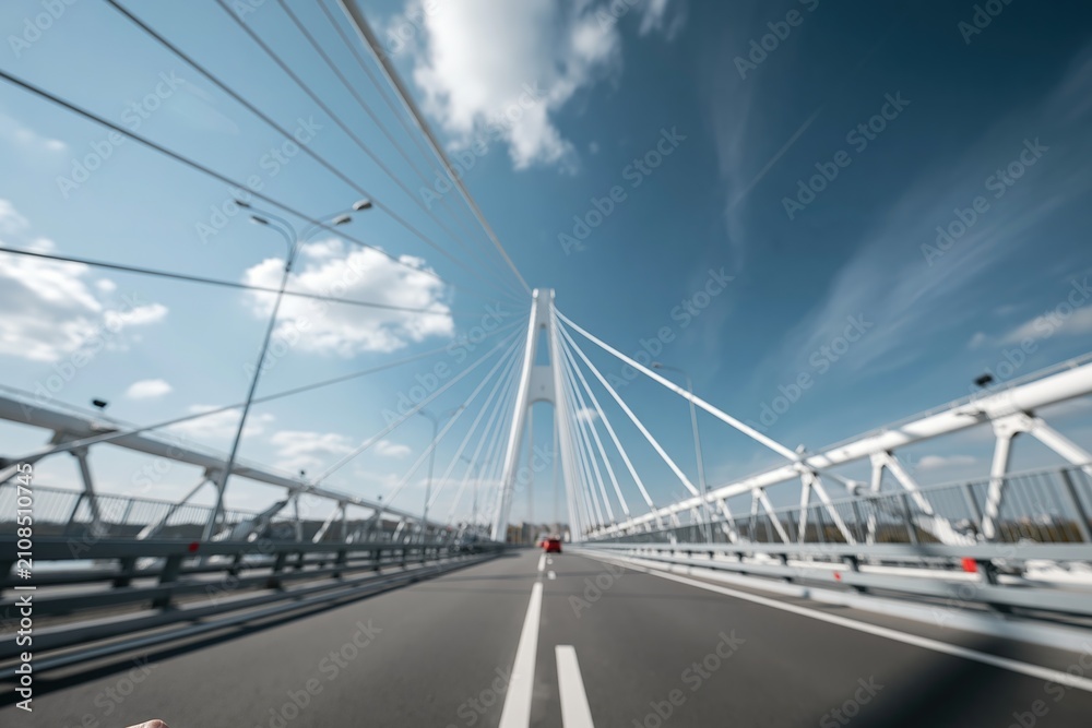 Obraz premium Blurred Bridge View with Cloudy Sky