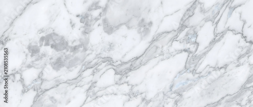 Fotografia Marble showcases a pristine white natural stone surface with elegant gray veinin