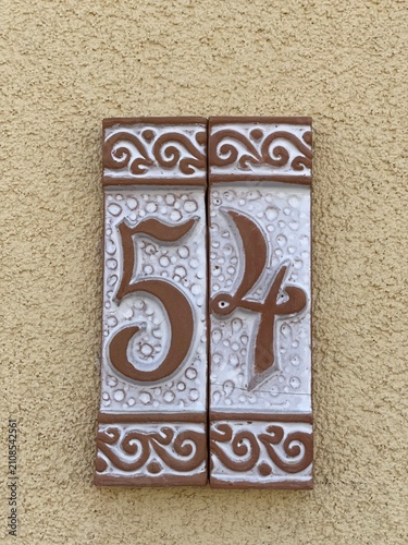 Ceramic tiles that say number 54