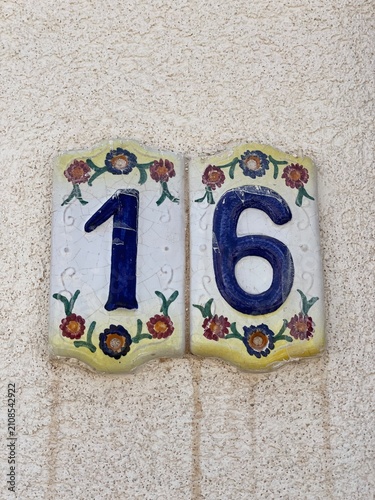 Hand painted Ceramic tiles that say number 16
