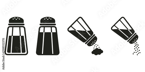 Foto Black silhouette salt and pepper shakers with pouring granules seasoning spice