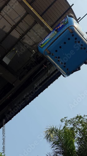 Slow motion video of cable car in amusement park