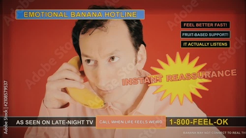 Comedic fake hotline advertisement featuring person holding banana phone against red . Parodies 1980s infomercial style with instant reassurance messaging and retro television aesthetic.
