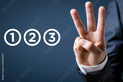 A businessman hand displays three raised fingers near numbered icons. Concept for business countdown or strategy.