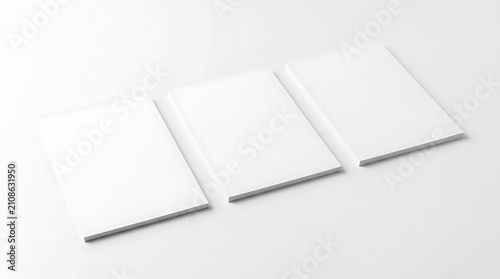 Three blank white notebooks with visible spine edges arranged in a row on a white background showcasing a clean and minimalist presentation ideal for graphic design mockups and product placement