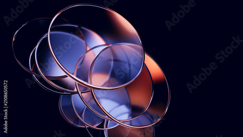 Interlocking glass rings with glossy copper reflections.