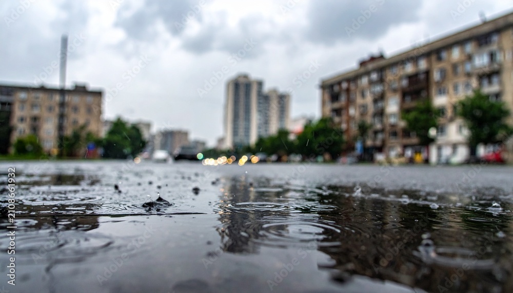 Fototapeta premium Raindrop in the city