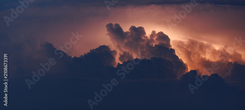 Lightning bolts in the cumulus clouds, powerful storm