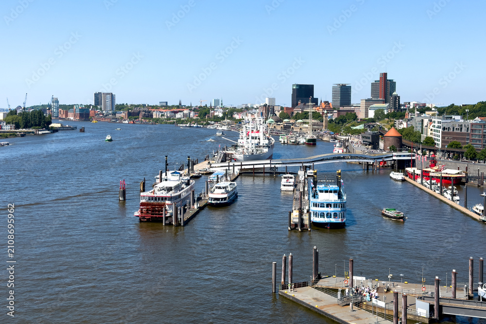 Fototapeta premium Elevated panoramic view of the Port of Hamburg and Landungsbruecken piers taken from the Elbphilharmonie plaza