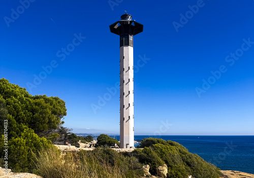 Obraz na plátne Harbor of Torredembarra and the lighthouse on Galera Point, Spain