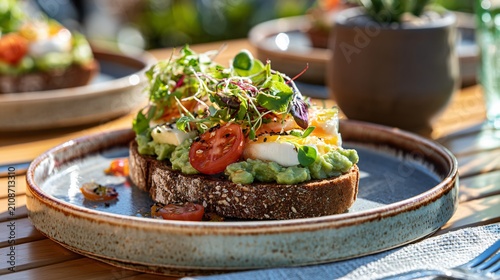 A rooftop cafe brunch scene featuring gourmet avocado toast served on handcrafted ceramics beneath bright summer sunshine