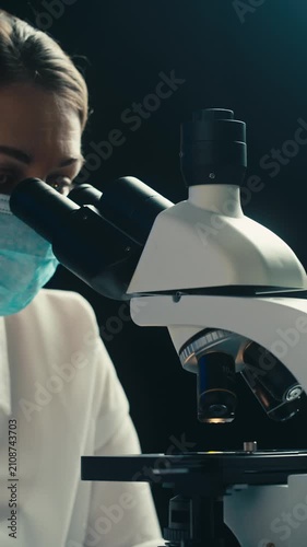 Engineer doctor working with microscope in laboratory, Scientific laboratory with various research equipment, man conducting experiments and research, Science and technology concept.