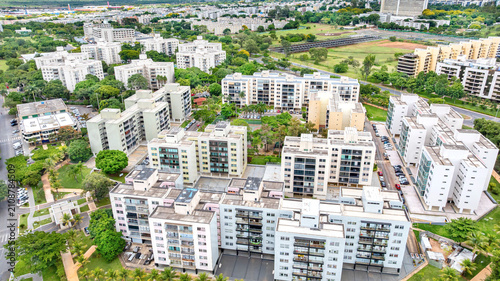 Aerial view of the Octogonal Sector neighborhood, notable for its octagonal-shaped residential buildings, planned green spaces and recreational areas, and proximity to City Park. Brasília, Brazil 2025