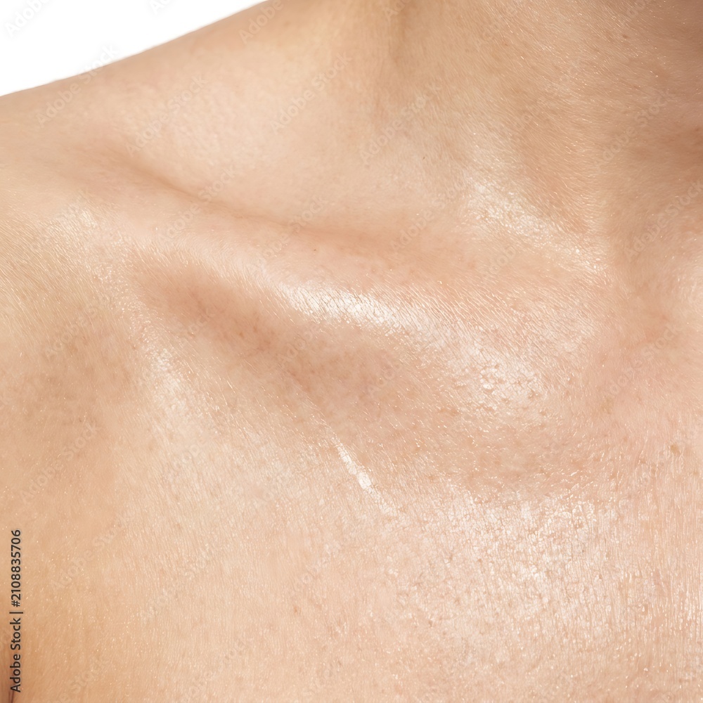 Fototapeta premium Macro photograph of human neck and collarbone skin with moisturizing serum