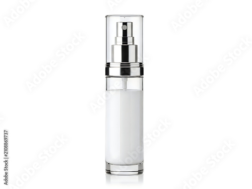 Clear cosmetic spray bottle with white cream isolated on white background
