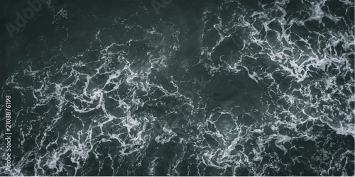 Фотография An aerial view of the vast ocean reveals mesmerizing patterns of churning water and white foam, showcasing the raw power and beauty of nature's artistry