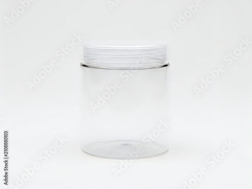 Empty clear plastic jar with screw cap isolated on white background