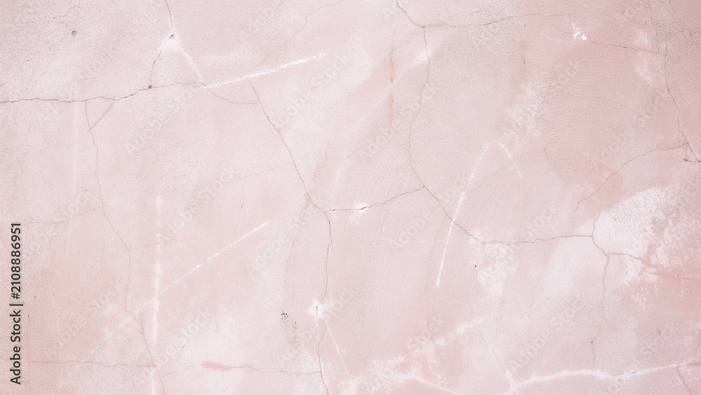 Fototapeta premium Pink concrete wall texture. Dusty rose cement background with weathered surface details.