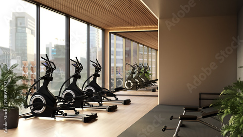 Cuadro en lienzo Modern fitness gym center with elliptical cross trainers and city view window