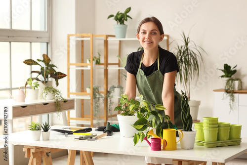 Smiling young woman in a gr...
