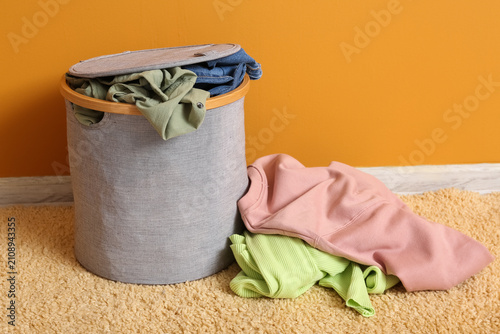 Laundry basket overflowing ...