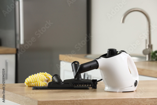 Modern steam cleaner with b...