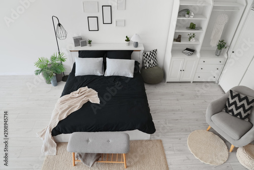 Interior of bedroom with ar...