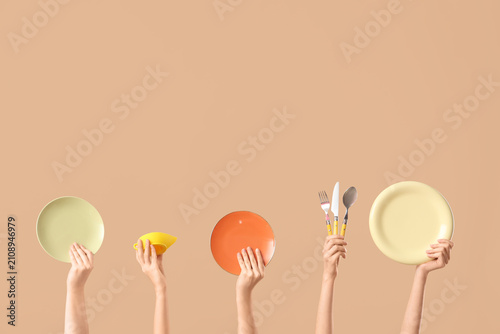 Female hands with plates, c...