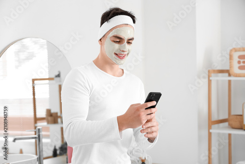 Young man with applied clay...