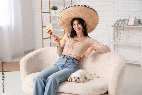 Young woman in sombrero wit...
