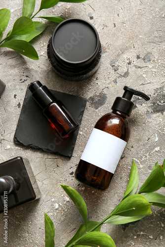 Bottles of shampoo and cosm...