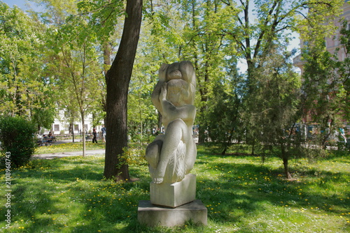statue of a woman in a park