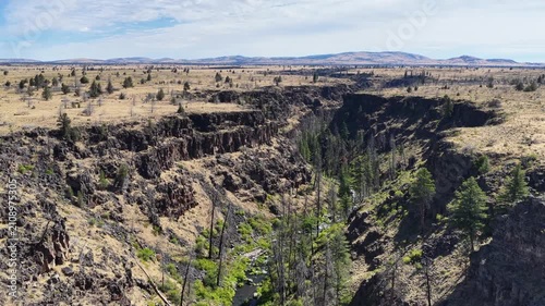 Over millennia Mill Creek has carved a 230-foot deep canyon on the Central Oregon plateau between Bend and Portland. This rugged yet scenic area of high desert is part of the Warm Springs reservation.
