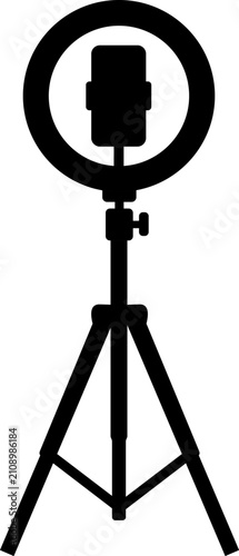 Ring light with tripod and phone holder silhouette icon for live streaming, blogging, studio lighting, photo, video production, content creation, and smartphone equipment concept design elements