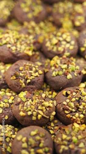 Making cookies with pistachios in a bakery
