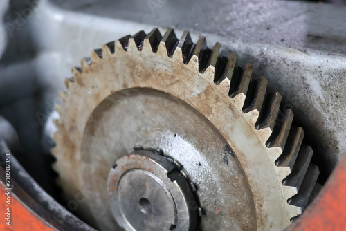 Industrial Metal Gear Mechanism Inside Heavy Machinery.