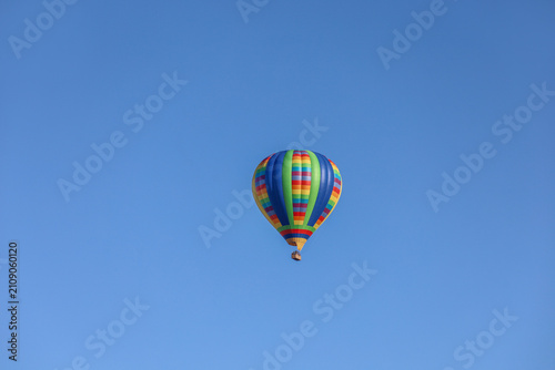 A colorful hot air balloon flying on the sky in Temecula California USA.